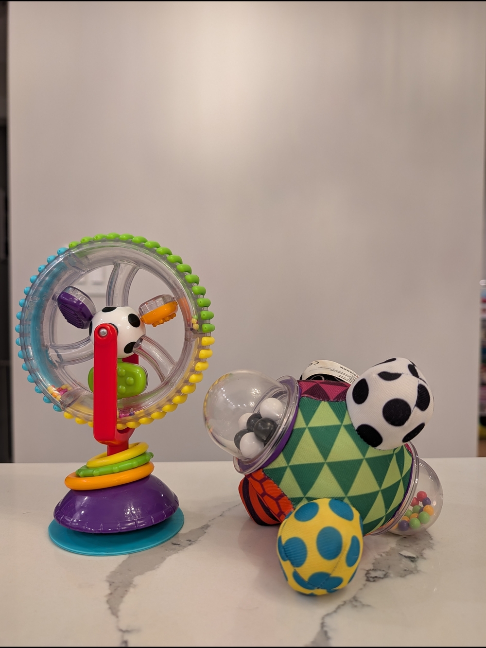 Sassy Toy Bundle Colorful Wonder Wheel Spinning Toy and Bumpy Ball Rattle Toy